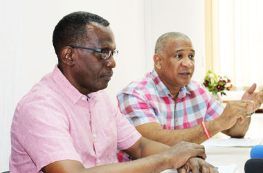 Image of Dr.Hilaire and Pierre at yesterday’s press conference. [PHOTO: PhotoMike]
