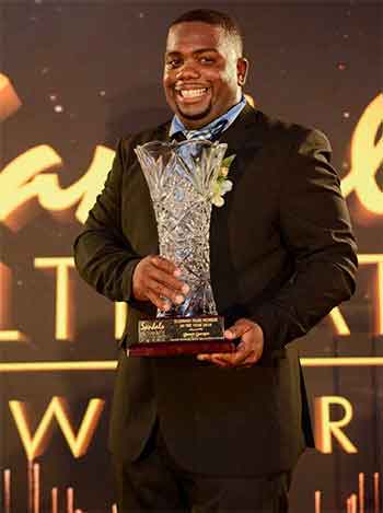 Image: The life of the party -- Jamer ‘Captain Neil’ Georges, a playmaker from Sandals Grande St. Lucian Beach Resort & Spa Entertainment Department -- Winner Ultimate Team Member of The Year.