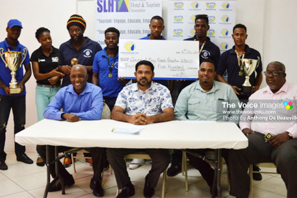Image: The 2017 SLHTA championship team, Coconut Bay, proudly displaying their winnings with SLHTA officials. (PHOTO: Anthony De Beauville)