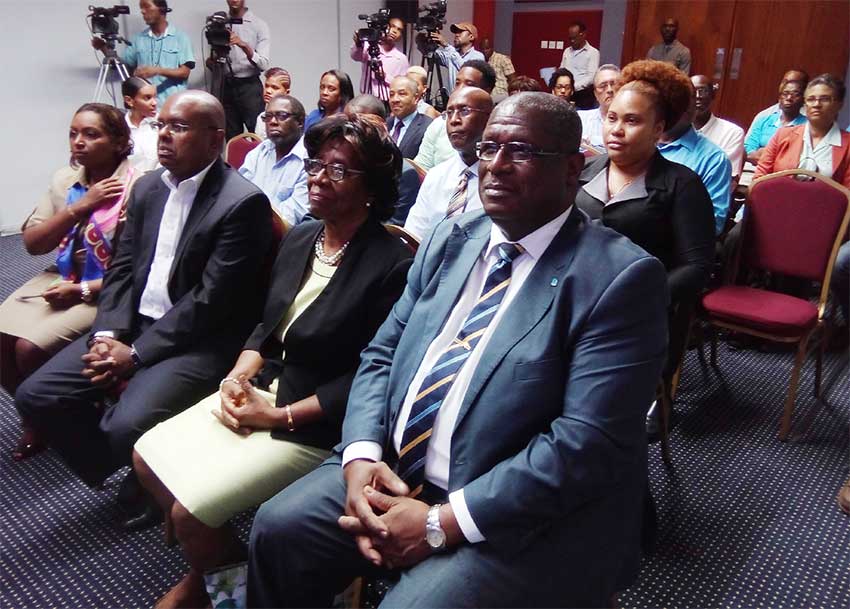 Image of Rambally (far left, front row) among other attendees at the book launch.