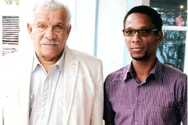 Image of Sir Derek Walcott and I at the launch of Nobel Laureate Week at Government House, January 2013.