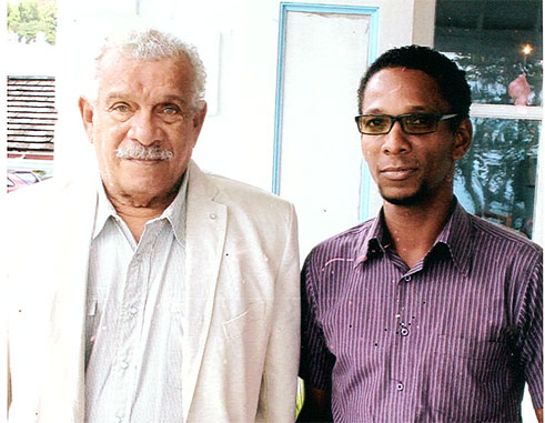 Image of Sir Derek Walcott and I at the launch of Nobel Laureate Week at Government House, January 2013.