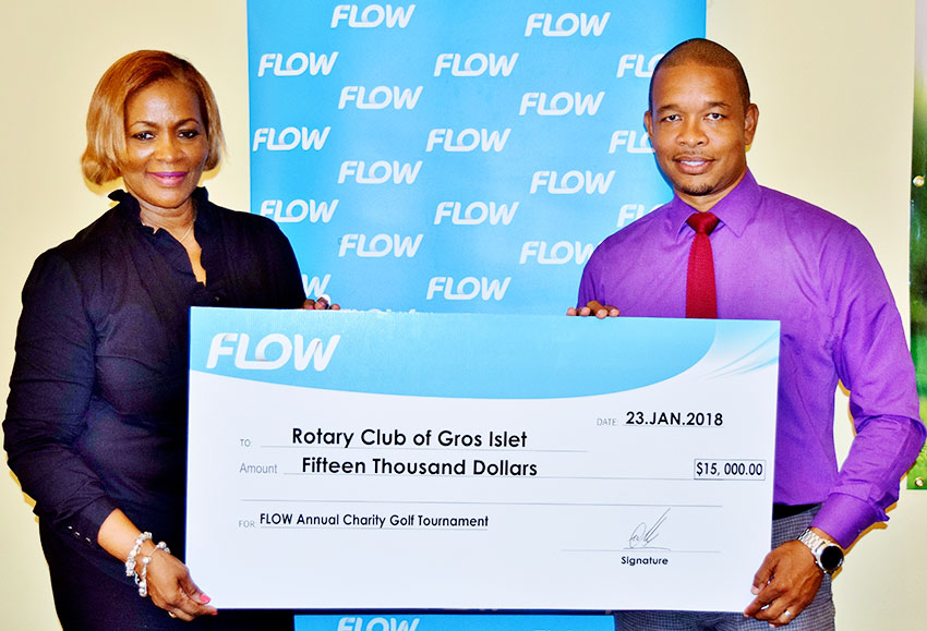 Image: Flow Communications Specialist, Terry Finisterre, presents the sponsorship cheque for the 2018 Golf Tournament to Rotary Club of Gros Islet president, Angela Clarke.