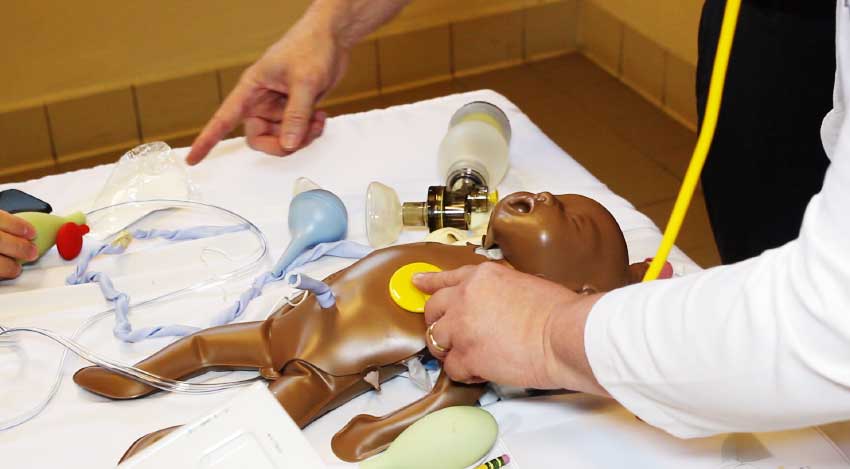 Image: Neonatal Resuscitation Training in session.