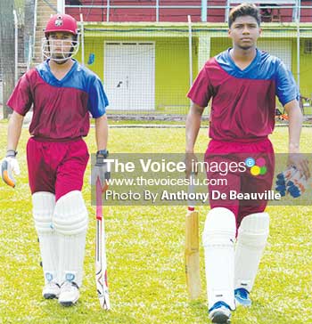 Image: (L-R) Dominic Auguste and Chaz Cepal resuming their innings after the lunch break (PHOTO: Anthony De Beauville)
