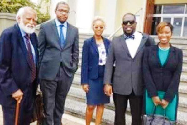 Image: THE WINNING TEAM: From left: Queens Counsel Elliott Mottley, Professor Eddy Ventose, attorneys-at-law Faye Finnisterre, Gregory Nicholls and Alicia Carter outside of the Supreme Court in Barbados
