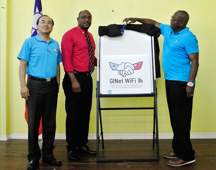 Image of Minister Edmund Estaphane, Hon. Shawn Edward and Mr. Louis Liou, Deputy Counsellor of the Embassy of the Republic of China (Taiwan) together announced the GINet Free WIFI Service Launched in Dennery North.