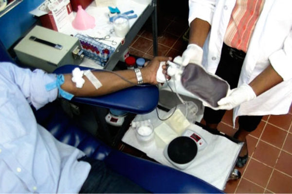 Image of a donor giving blood