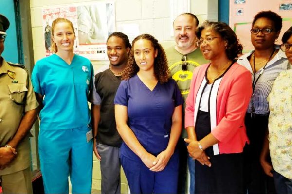 Image of Health Minister Mary Isaac and Sandals Great Shape staff and participants.