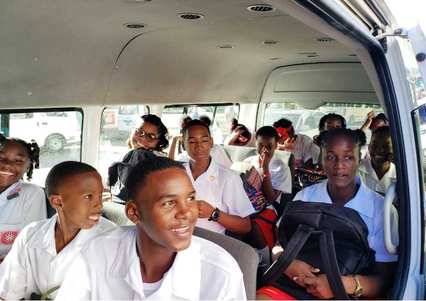 Image: FREE RIDE! Students boarded buses for free rides to school on first day back at class.