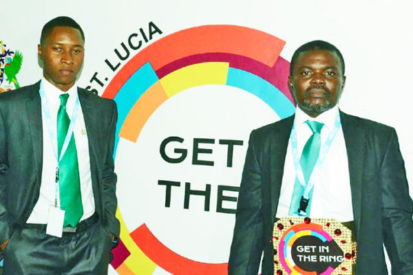 Image of Get in the ring 2018 winner Patrick Eze of Eze green (right) and Gitr 2018 wildcard winner represented by Denell Florius, Co founder of EcoCarib Inc.