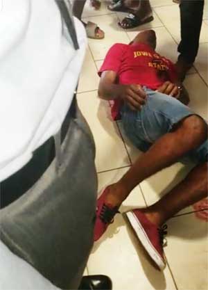 Image of victim on the floor of the mall