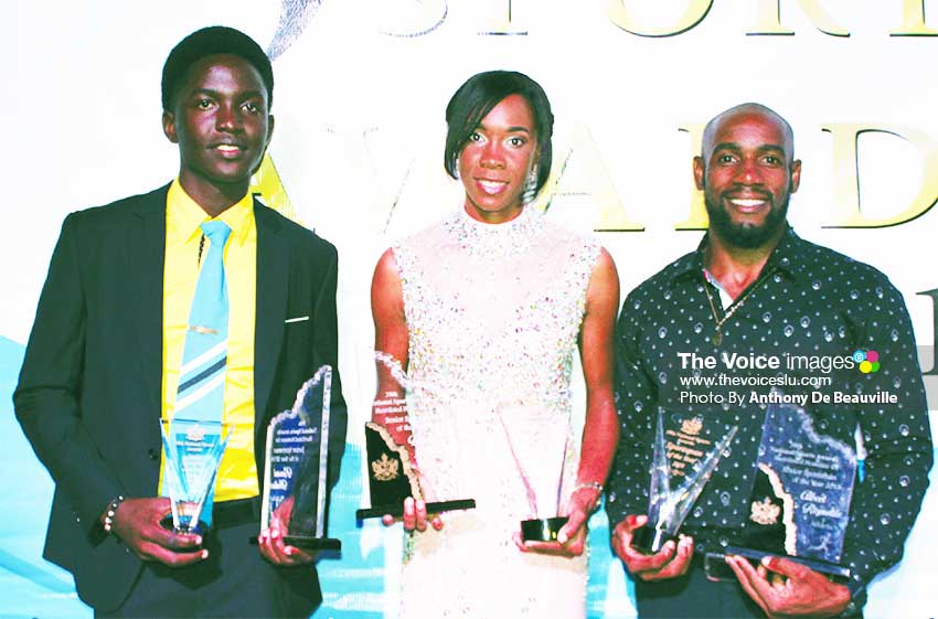 Image: (L-R) A proud moment for the Babonneau connection, Kimani Melius (Junior Sportsman for the Year), Levern Spencer and Albert Reynolds (Senior Sportswoman and Sportsman for the Year). (PHOTO: Anthony De Beauville)