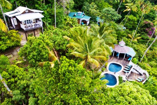 Aerial view of cottage and pools at Fond Doux Plantation & Resort.