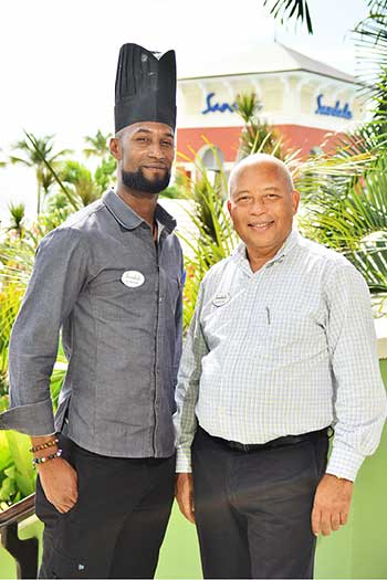 Image of Sandals Regency La Toc Resort and Spa's Chef Clayton Julien (l) and Sandals Saint Lucia Managing Director Winston Anderson.