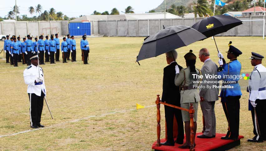 Image of Prince Charles (at right on podium) was a guest of honour at Sunday’s post-Independence ceremony at the Phillip Marcellin Grounds. (PHOTO: PhotoMike]