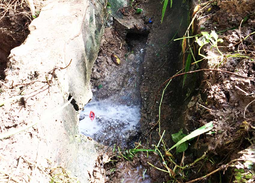 Image: Ruptured WASCO pipe inside drain in Independence City.