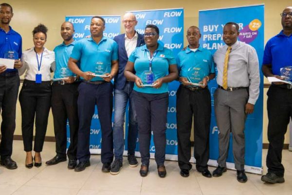 Image: This week FLOW honoured nine team members for their long service to the company.