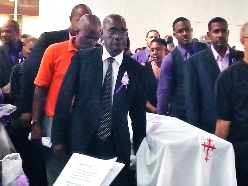 Image of media personality Harold George being laid to rest 