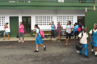 Image of parents and students leaving the school.