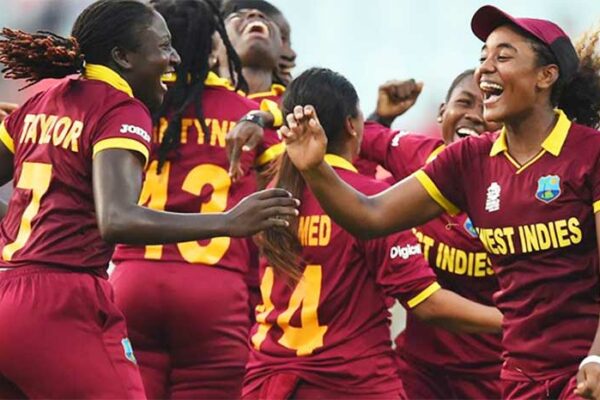 Image: Windies women celebrate the fall of another wicket. (PHOTO: AFP)