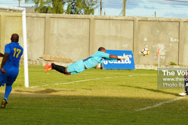 Image: In spite losing 3-2 to Central Vieux Fort, Caricom Maters (goalkeeper) Lawrence Octave came up with a brilliant save. (PHOTO: Anthony De Beauville)