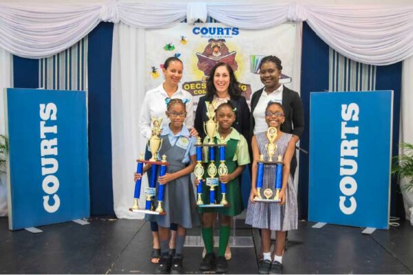 Image: The top place finishers in the 10th edition of Courts’ Annual National Reading Competition.