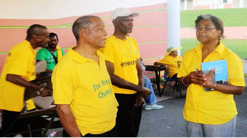 Image: Victor Maurice (third from left) in his capacity of Councilor with Health Minister Mary Isaac.