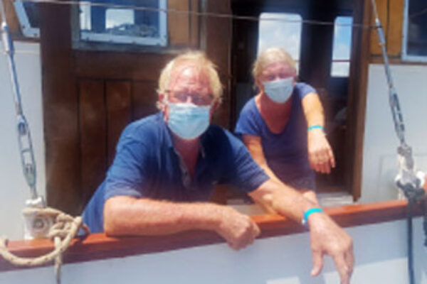 Image of Sailors donning their ‘Sailing with the Caribbean Bubble’ blue wristbands.