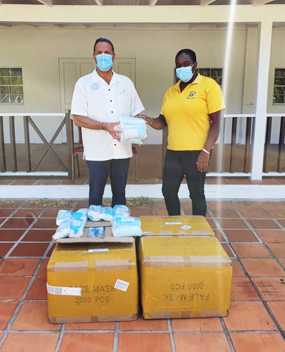 Image of Zone Chair receiving Donation of Masks.