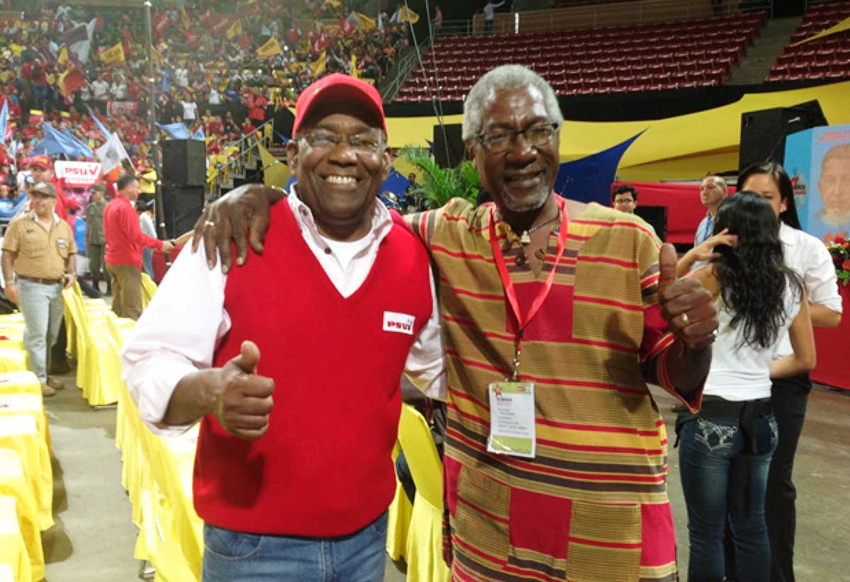 Image: AristobuloIstruiz (left) and Earl Bousquet at the Third Congress of the United Socialist party of Venezuela (PSUV) in 2017. (PHOTO: by Leiff Escalona)