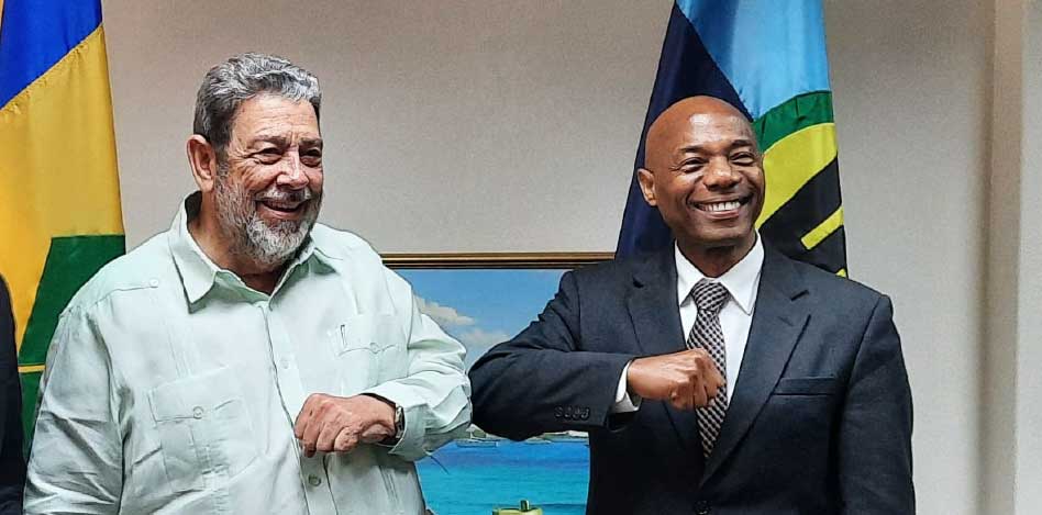 President of the Caribbean Development Bank (CDB) Dr. Gene Leon (right) and Prime Minister of St. Vincent and the Grenadines, (SVG) Dr. Ralph Gonsalves.