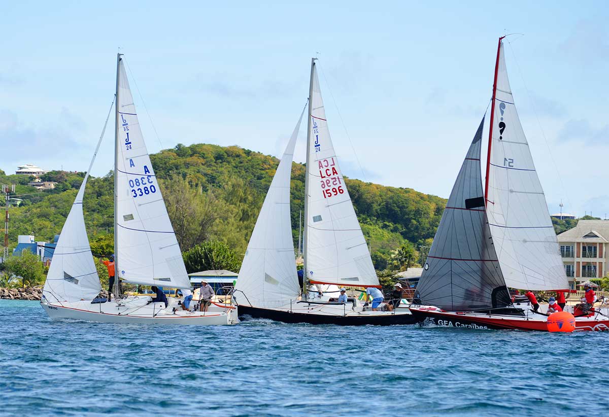 The combined J24/ Surprise Class jostling for an advantage on marker No. 2 (Photo: Anthony De Beauville)