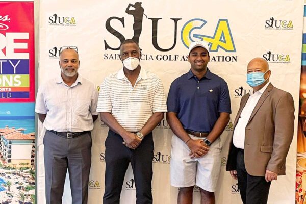 L-R: Dr. Naveen Urs – Father of Yadhu Urs, Dr. Kent Glace – President of the Saint Lucia Golf Association, Yadhu Urs – Saint Lucian Golfer, Mr. Winston Anderson – Managing Director Sandals Resorts EC.