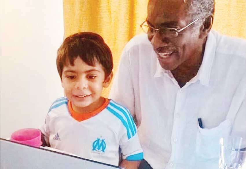 Dr. St Rose with his grandson