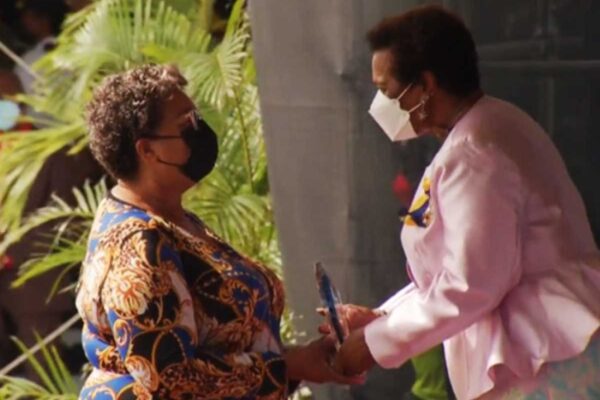 Dr St John receives Award from Barbados.
