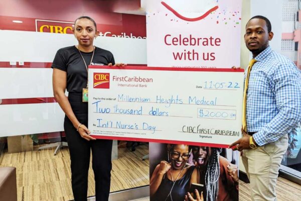 Lee Ann Louisy – Representative from Millennium Heights Medical Complex (Senior Executive of Employee Engagement Reward Recognition), and Kendal Joseph – Customer Service Officer, CIBC FirstCaribbean.