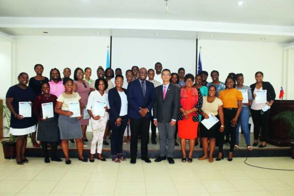 Ambassador Peter Chen, Education Minister Hon. Shawn Edward, Parliamentary Secretary Hon. Dr. Pauline Antoine-Prospere, and Permanent Secretary Michelle Charles with the scholarship awardees and their representatives at last Tuesday’s scholarship awards ceremony.