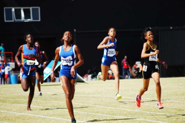 Secondary school students compete at track meet.