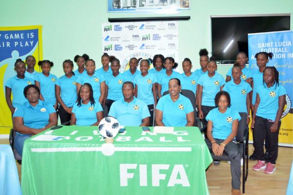 Saint Lucia’s National U-14 Girls team alongside technical unit staff [Photo credit : Dave Pascal]