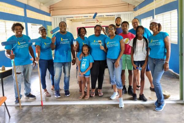 The dedicated team from Beacon St Lucia that selflessly contributed their time to repaint four classrooms at the Grand Riviere Primary School.