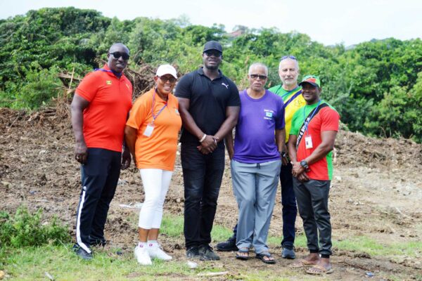 Sports Minister Kenson Casimir along with OECS Swimming Association representatives visit the site for the National Aquatic Centre