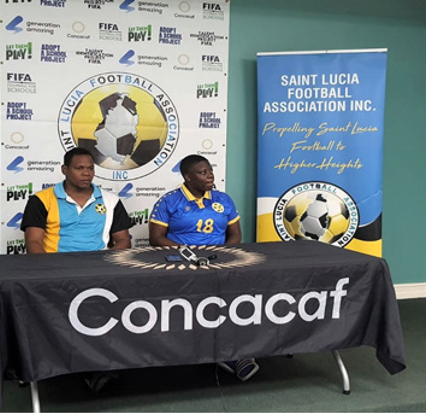 Assistant coach Hiram Hunte and Eartha Pond speaking to reporters at a post-match interview