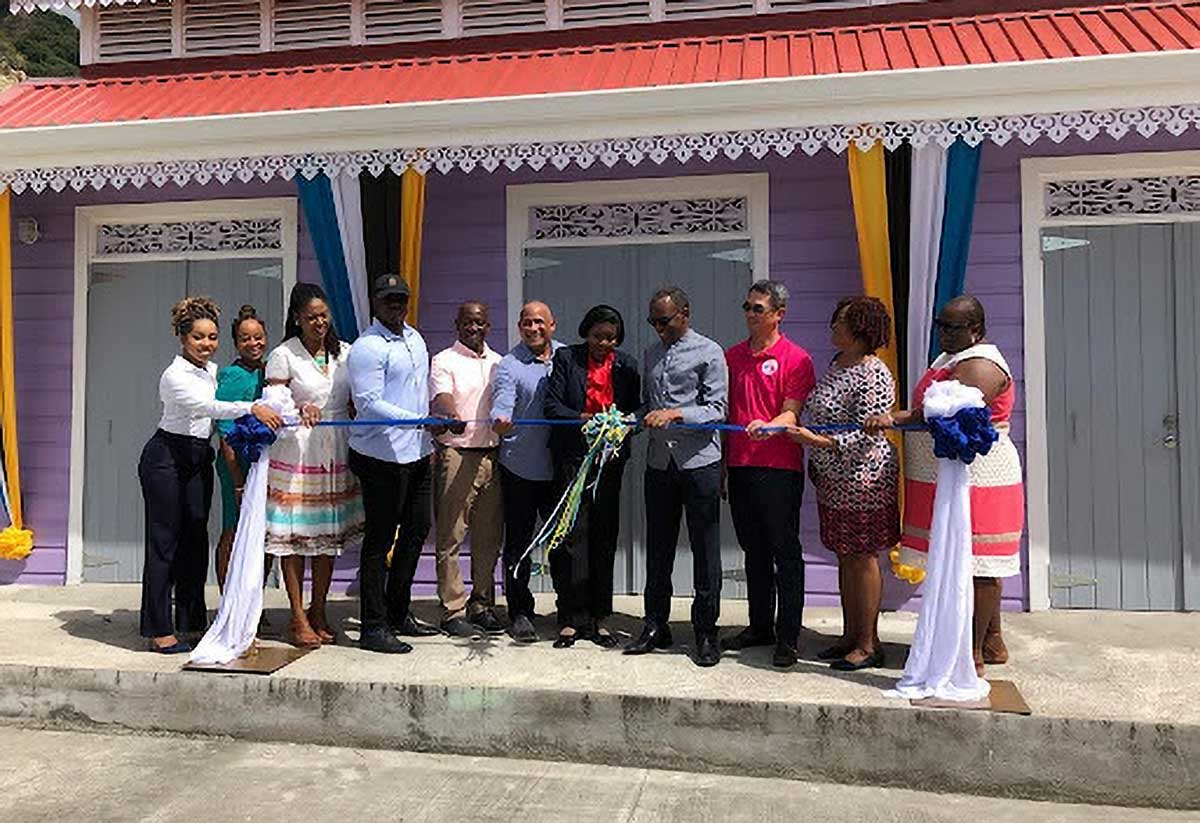 H.E. Peter Chen, Taiwan’s Ambassador to Saint Lucia, joins Hon. Philip J. Pierre, Dr. Hon. Ernest Hilaire, Hon. Emma Hippolyte, Hon. Moses Jn. Baptiste, Hon. Kenson Casimir, Hon. Dr. Virginia Albert-Poyotte, Hon. Alfred Prospere, Permanent Secretary Donalyn Vittet, and Hon. Dr. Pauline Antoine-Prospere, and others at the ribbon-cutting ceremony at one of the two facilities in Soufriere town on Wednesday, December 20, 2023.