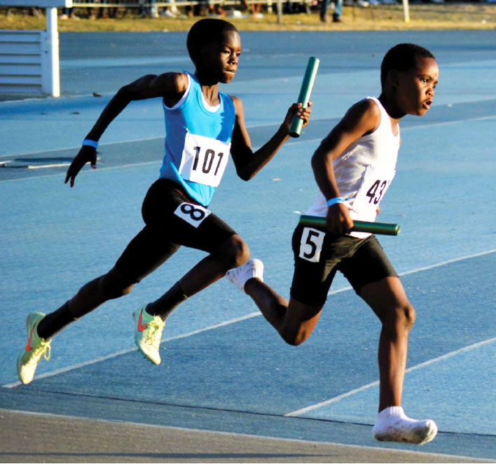Youth athletes compete on the race track
