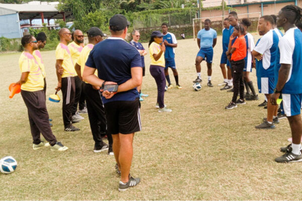 FIFA officials and local match officials participate in a practical workout