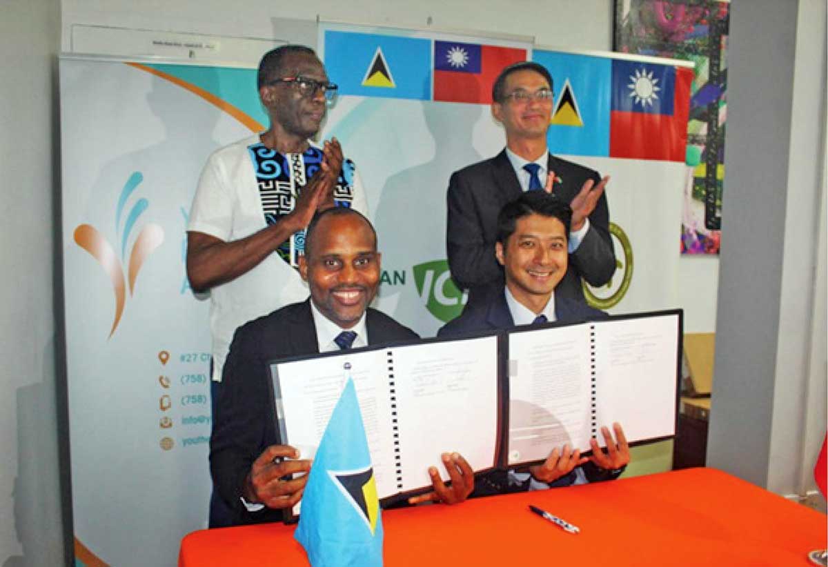 Mr. Bryan Vidal, CEO of the Youth Economy Agency, and Mr. Daniel Lee, Chief of the Taiwan Technical Mission, display the signed Technical Cooperation Agreement, while H.E. Peter Chia-Yen Chen, Taiwan’s Ambassador to Saint Lucia, and Hon. Philip J. Pierre, Prime Minister and Minister for Finance, Economic Development and the Youth Economy & Minister for Justice and National Security, look on.