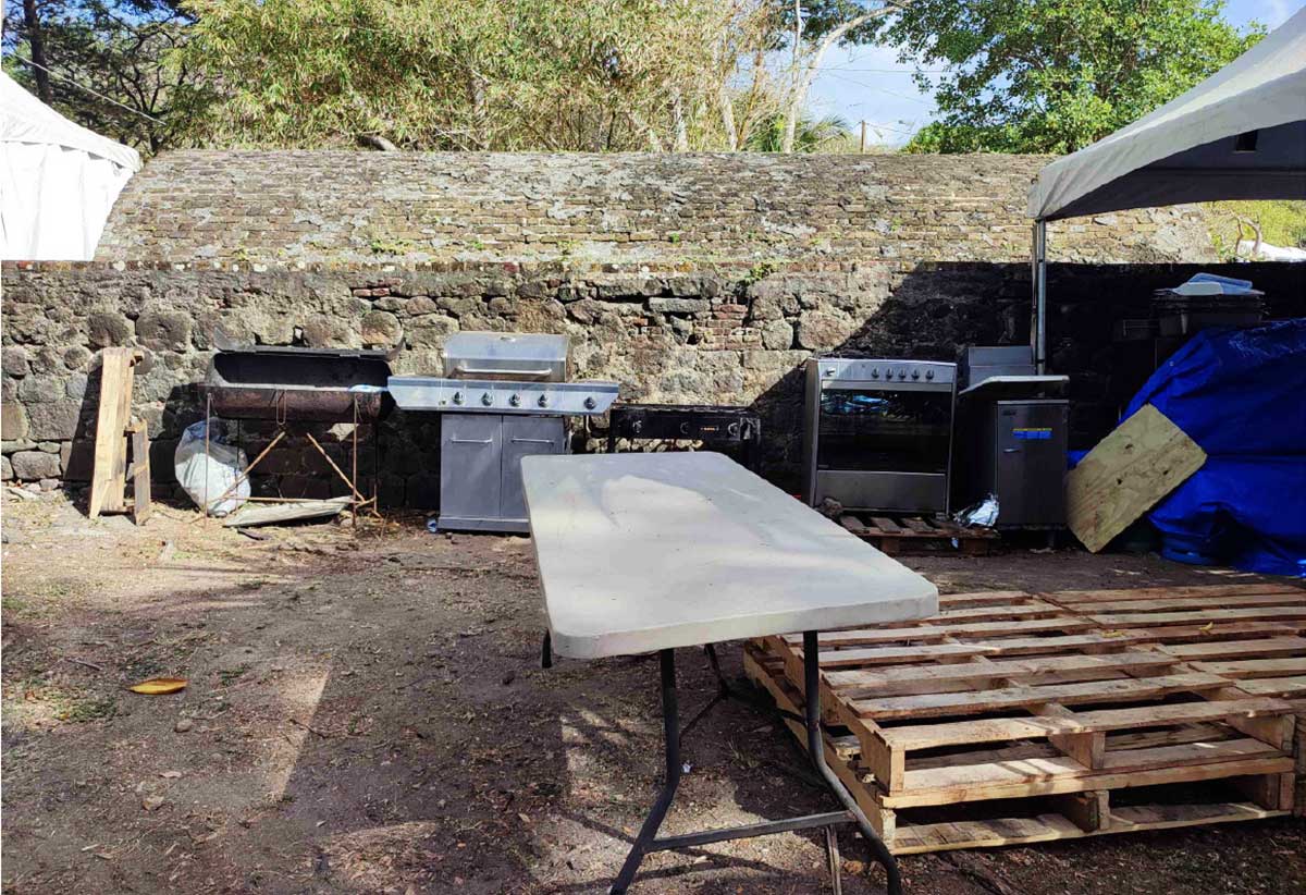 Cooking equipment set up under historic structure