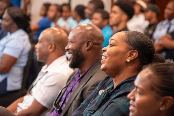 Happy team members captured during the recent Sandals Resorts International town hall meeting, where Executive Chairman Adam Stewart announced birthday and paternity leave entitlements