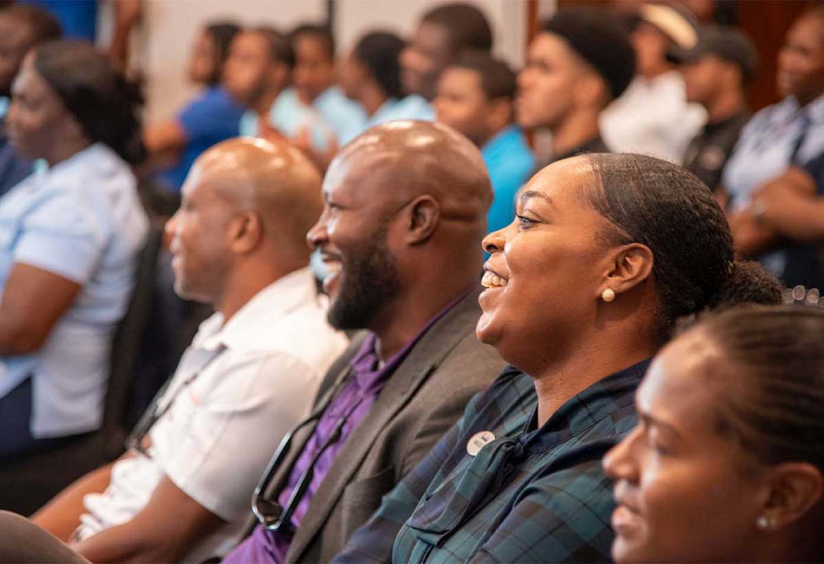 Happy team members captured during the recent Sandals Resorts International town hall meeting, where Executive Chairman Adam Stewart announced birthday and paternity leave entitlements